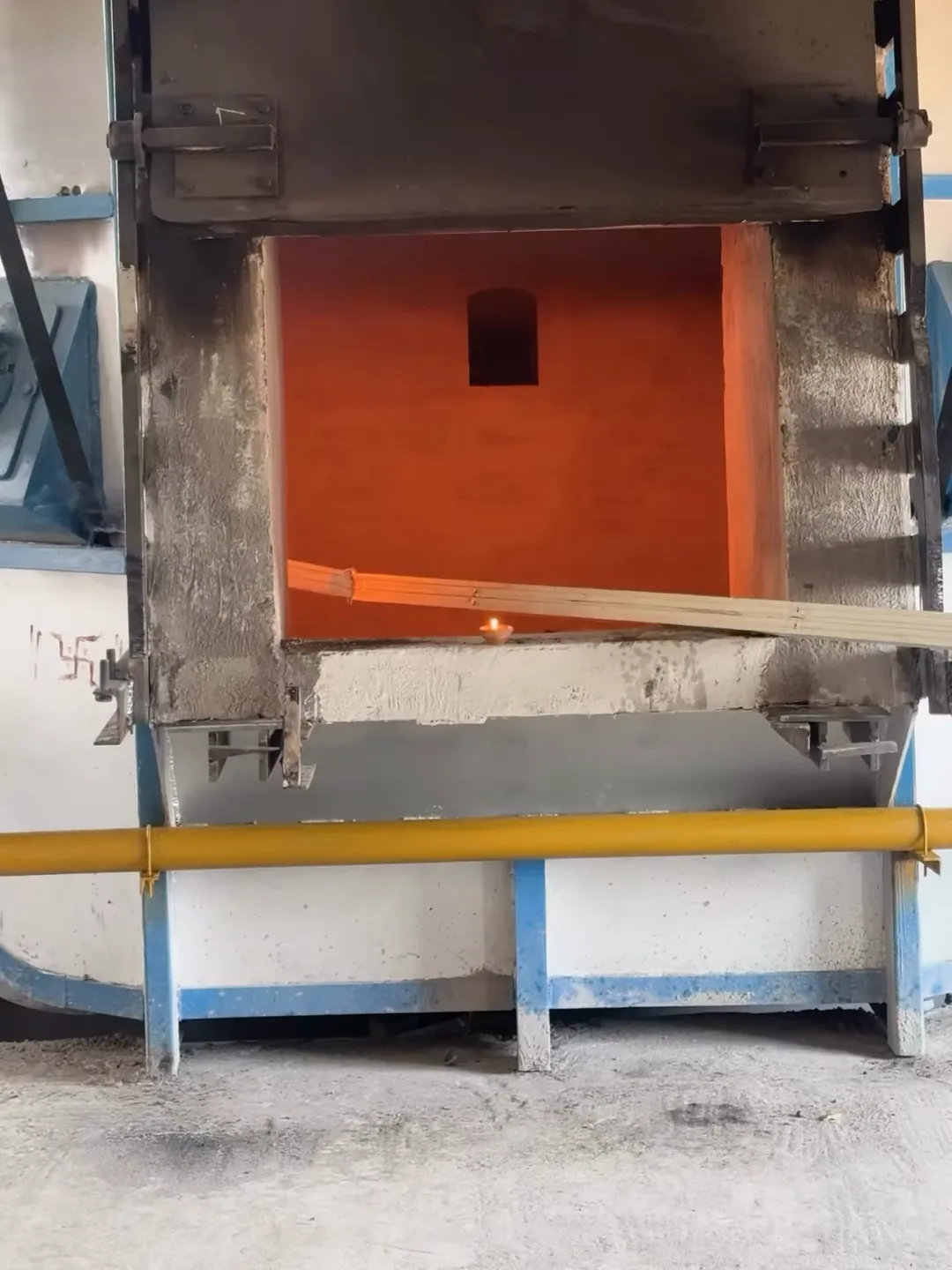 The melting furnace with its door open